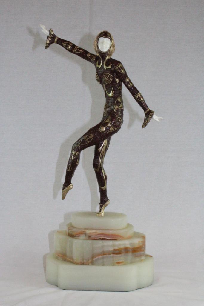 Bronze Art Deco Sculpture "Solo" on Onyx Base: Bronze Art Deco Sculpture "Solo" on Onyx Base. Hand rubbed gold and bronze sculpture of a performer. From Private Collector. Approximately 20 x 8.5 x 5.5 inches