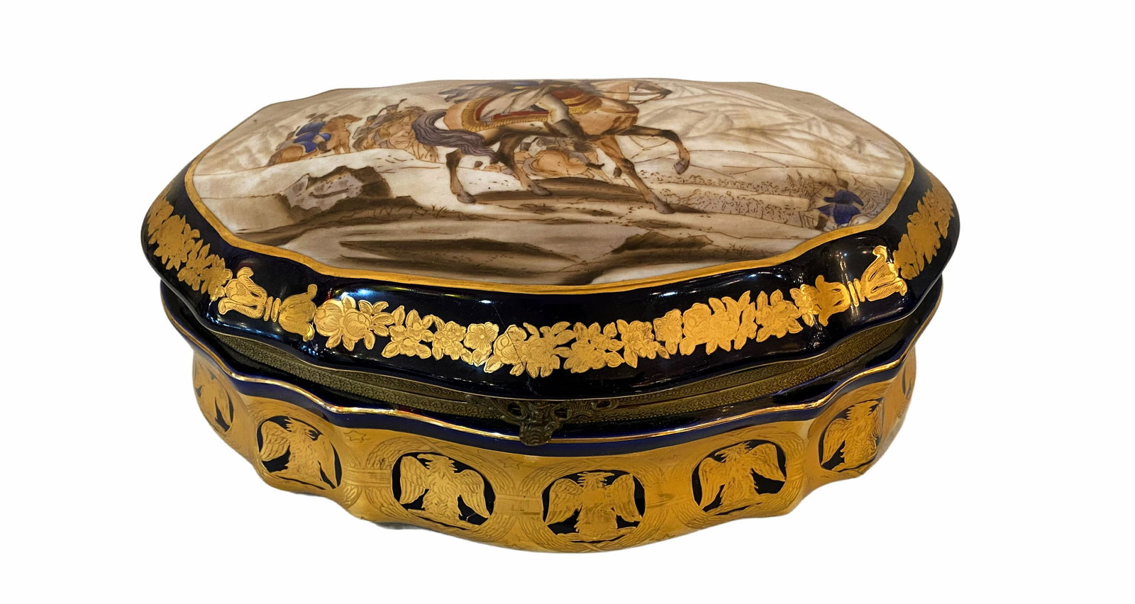 Hand Painted Ormolu Mounted Porcelain Box: Hand Painted Ormolu Mounted Porcelain Box. Decorated with floral designs, 24k gold leaf adornments and bronze ormolu mounted hinges. Depicting an intricate naturate scene. Approximately 13 x 9 x 5.5 i