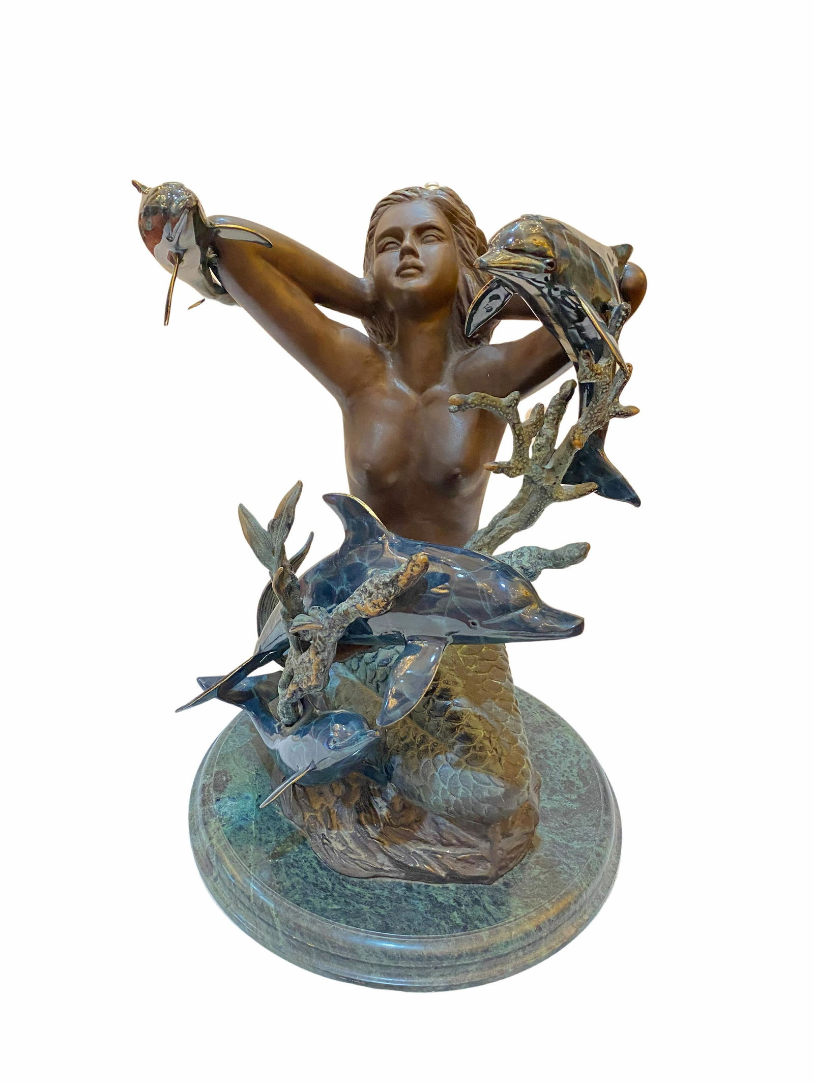 Oval Glass Top Table with Bronze Base Depicting a: Oval Glass Top Table with Bronze Base Depicting a Mermaid and Dolphins. Glass Top is 3/8" x 27.5" x 22" inches, the base is 21" x 15" x 15" inches