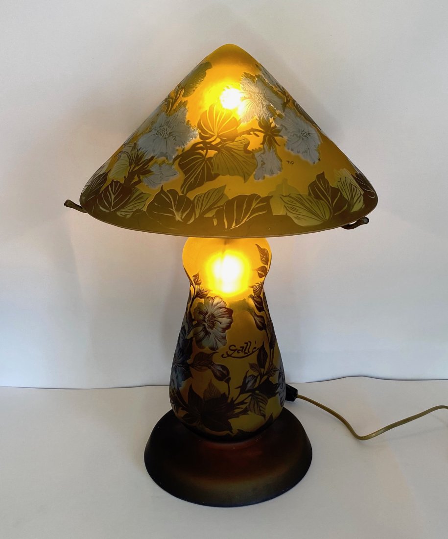 French Art Nouveau Cameo Glass Table Lamp: French Art Nouveau Cameo Glass Table Lamp.Blue Hibiscus and Green foliage on a lighter green base. Signed Galle Approximately 20" H x 12" W x 12" D
