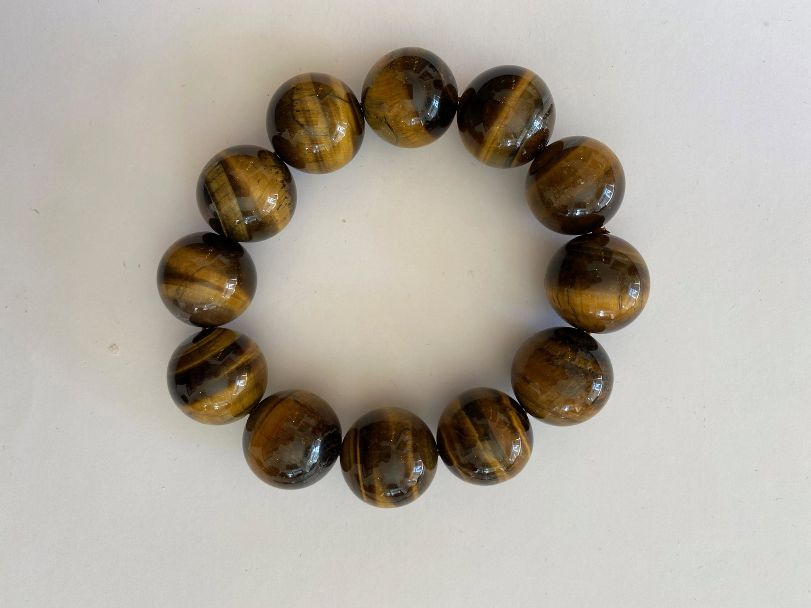 Large Bead Tiger Eye Bracelet: Large Bead Tiger Eye Bracelet on an Elastic Cord.