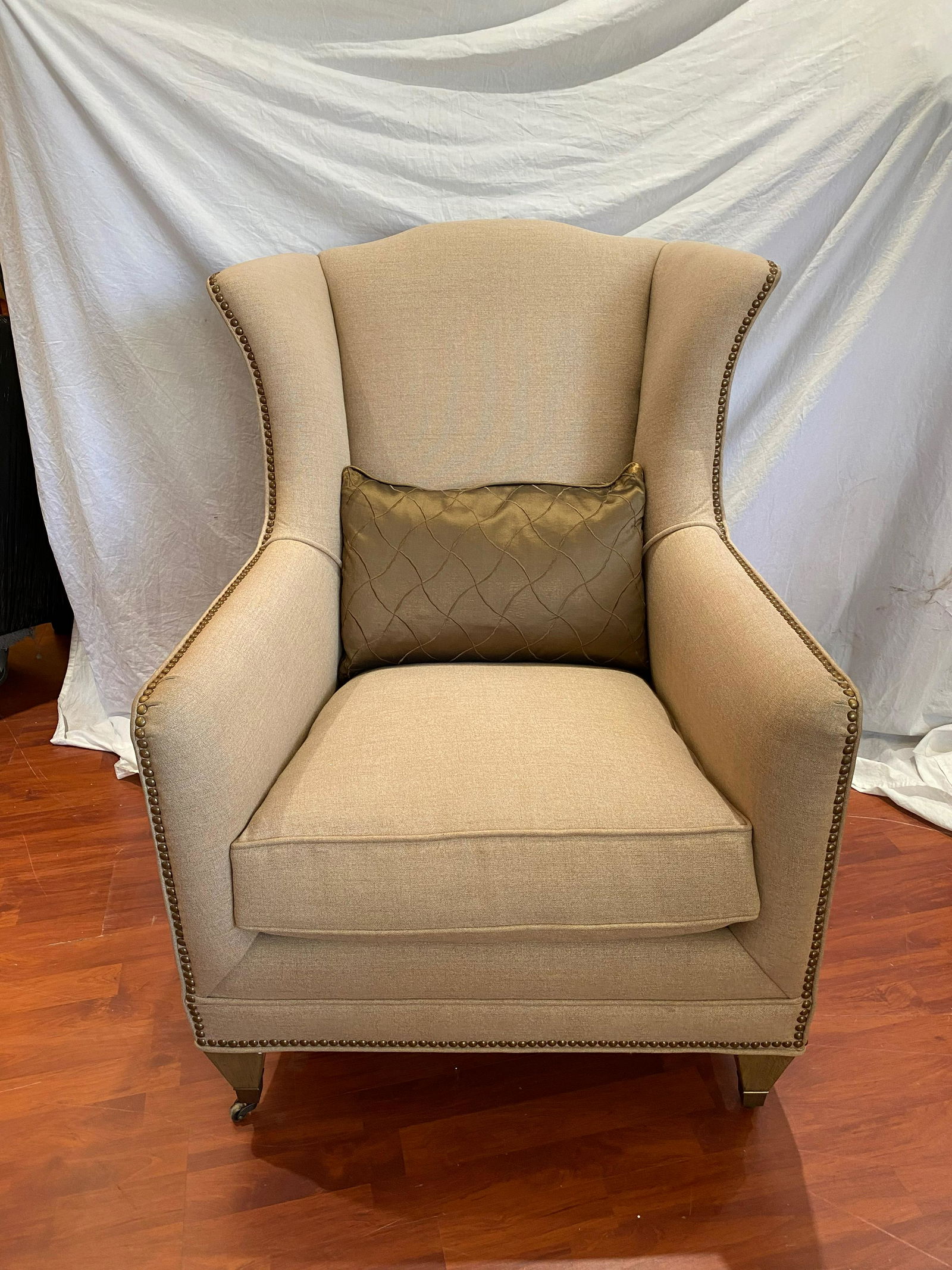 Wingback Chair with Brass Nailheads: Wingback Chair with Brass Nailheads Good condition, has a mark on the left arm that I have not tried to remove. See last photo Approximate Dimensions 41"H x 31"W x 31"D, Seat 19.5"H x 21.5"W x 23"D