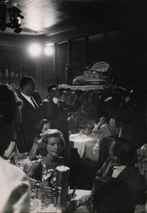 CALIFORNIA MID-CENTURY: Loomis Dean: Loomis Dean, Frank Sinatra's Pizza Party, 1955, Vintage gelatin silver print, 13.5" x 9.5". Artist's credit stamped for LIFE on verso. Print details stamped on verso. Additional LIFE stamp on verso. D