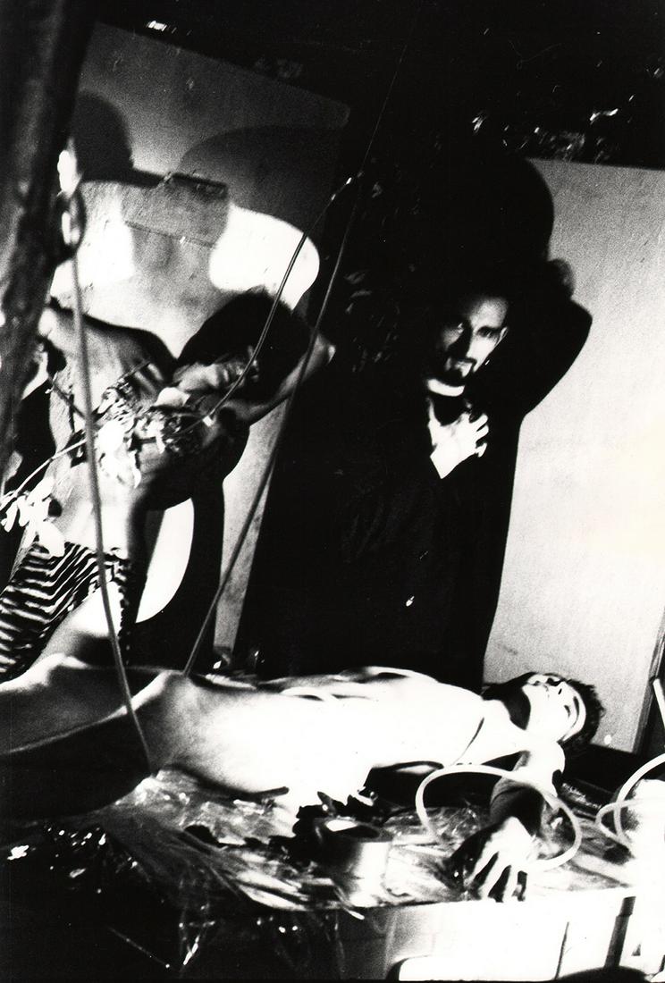 Billy Name, Ivy Nicholson, Jack Smith, Ron Link, c.1965: Billy Name, Ivy Nicholson, Jack Smith, & Ron Link in Batman/Dracula, c. 1965, Gelatin silver print, 14" x 11". Signed in pen on recto. Number affixed to verso. Exhibition labels on accompanying board.