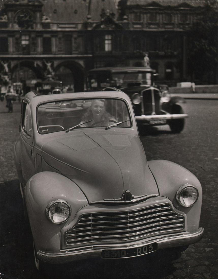 Robert Doisneau, Simca 6 Automobile, 1950: Robert Doisneau, Simca 6 Automobile, 1950, Vintage gelatin silver print, 9.25" x 7.25". Artist's credit stamped on verso. Titled and dated in pen on verso. Number stamped on verso.