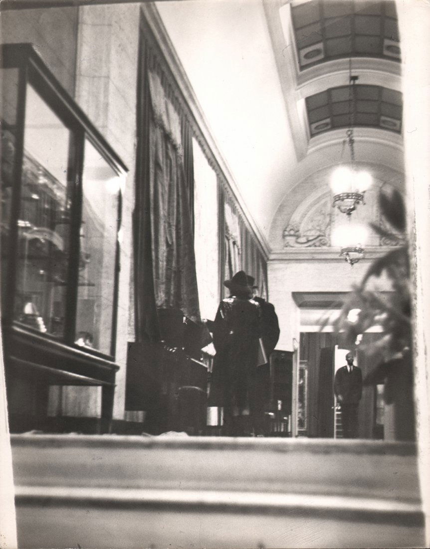 Robert Frank, Garbo & George Schlee at Parke Bernet, n.: Robert Frank, Garbo & George Schlee at Parke Bernet, n.d. Vintage gelatin silver print, 14" x 11". Matted. Artist's credit and title in pen on verso.