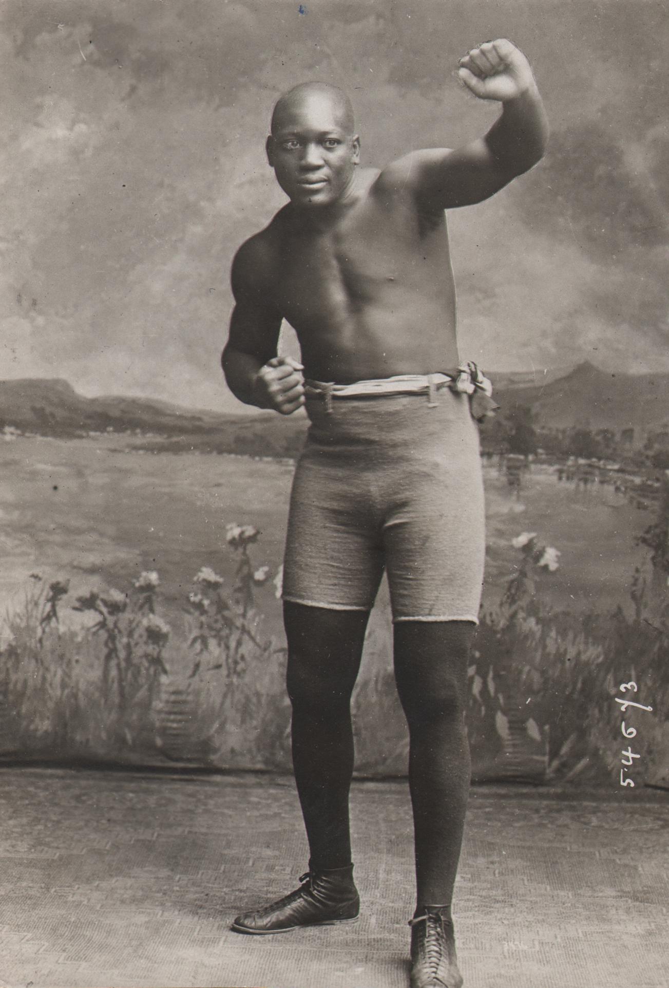 Rene Dazy, Boxer Jack Johnson, c. 1915: Rene Dazy, Boxer Jack Johnson, c. 1915, Vintage gelatin silver print, 6.5" x 4.5". Numbered in negative. Artist's credit stamped x3 on verso. Title and notes on verso.