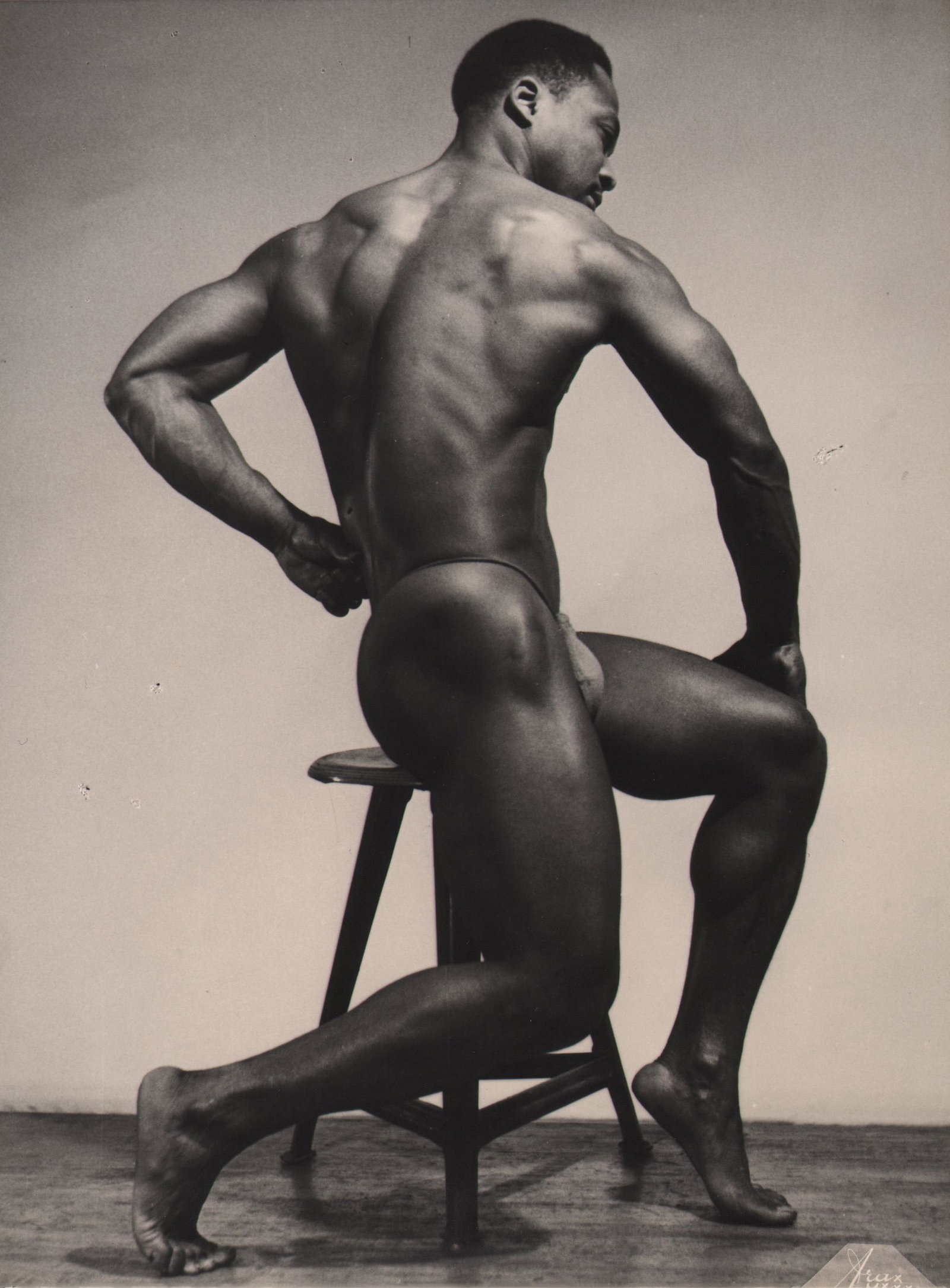 Studio ARAX, Bodybuilder Ron Eland, 1953: Studio ARAX, Bodybuilder Ron Eland, 1953, Vintage gelatin silver print, 10" x 8". Studio ARAX credit stamped on verso. "Collection Lucien Bacquemane" stamped on verso. Title and date in pen on verso. 
