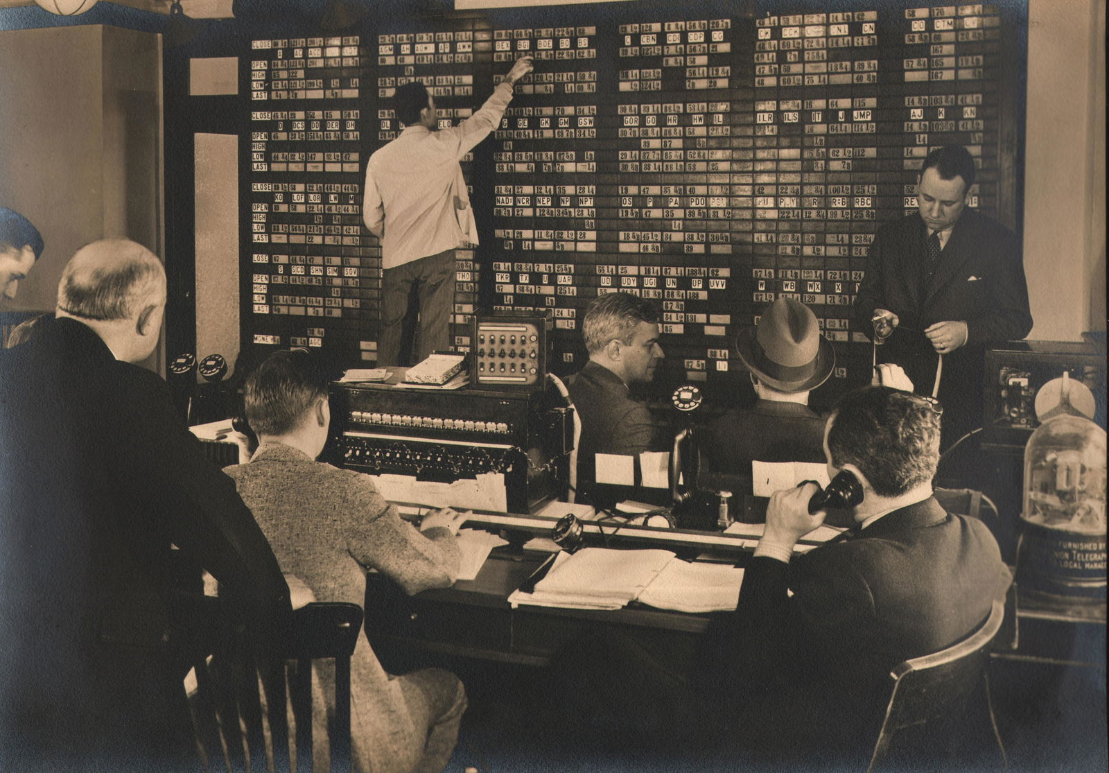 Margaret Bourke-White, New York Stock Exchange, 1936: Margaret Bourke-White, New York Stock Exchange, 1936, Vintage gelatin silver print, 9.25" x 13.25", mounted 14" x 19". Matted. Artist's credit stamped on mount verso. Margaret Bourke-White was born in