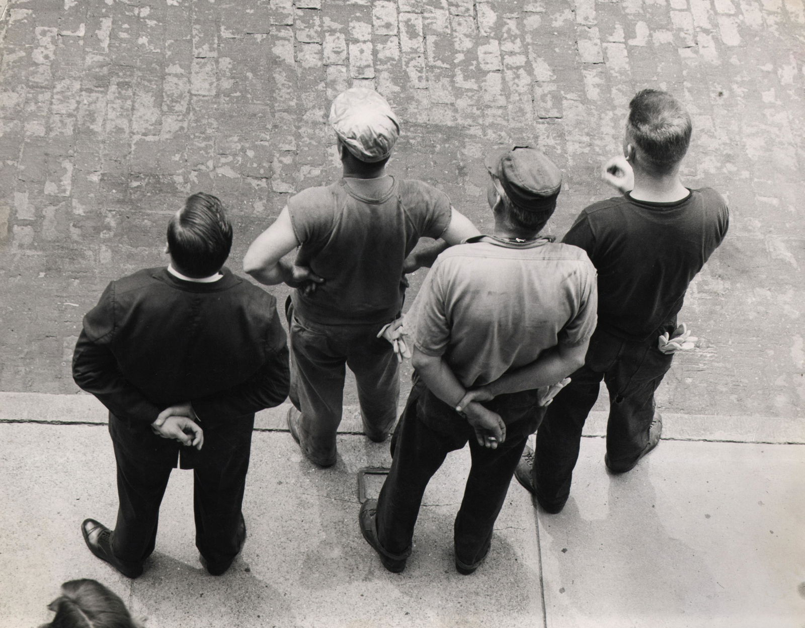 Ormond Gigli, [Four men], c. 1950: Ormond Gigli, [Four men], c. 1950, Vintage gelatin silver print, 11" x 14". Artist's credit stamped on verso. Globe Photos credit stamped on verso. Number stamped on verso. Ormond Gigli is a celebrate