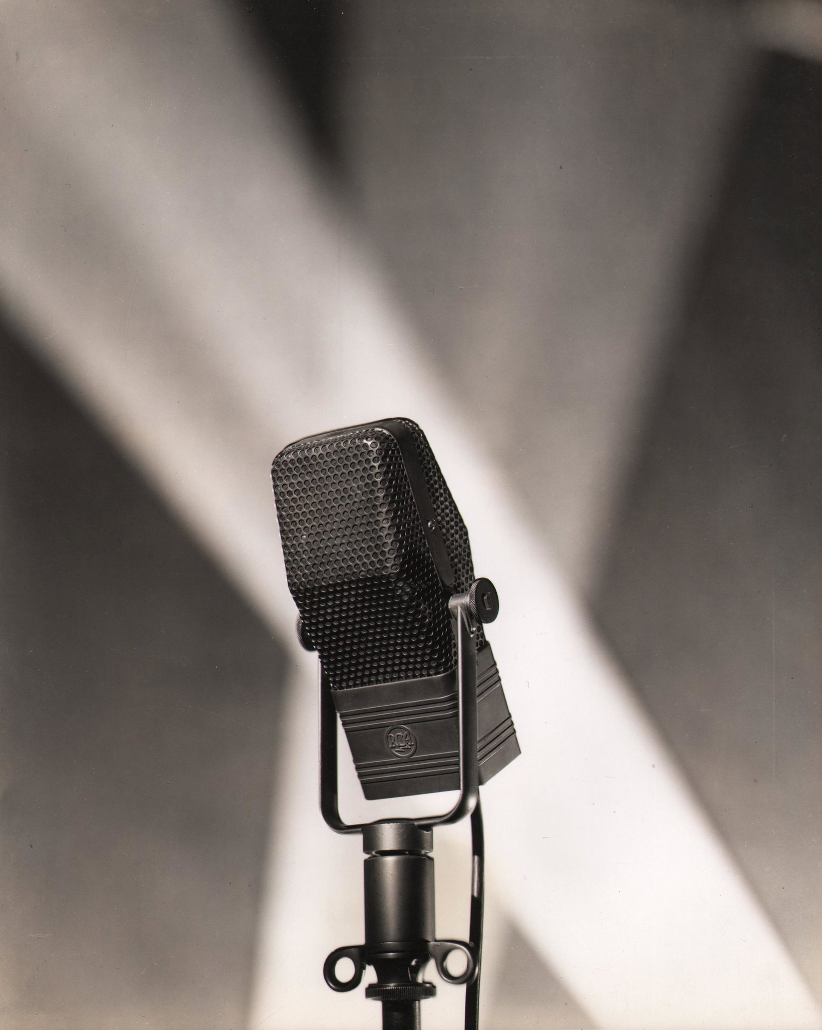 Sheldon Hine, RCA Microphone, 1930s: Sheldon Hine, RCA Microphone, 1930s, Vintage gelatin silver print, 9.5" x 7.5". Signed in pencil on verso. Throughout his career, much of the focus of this photographer, photojournalist and inventor w