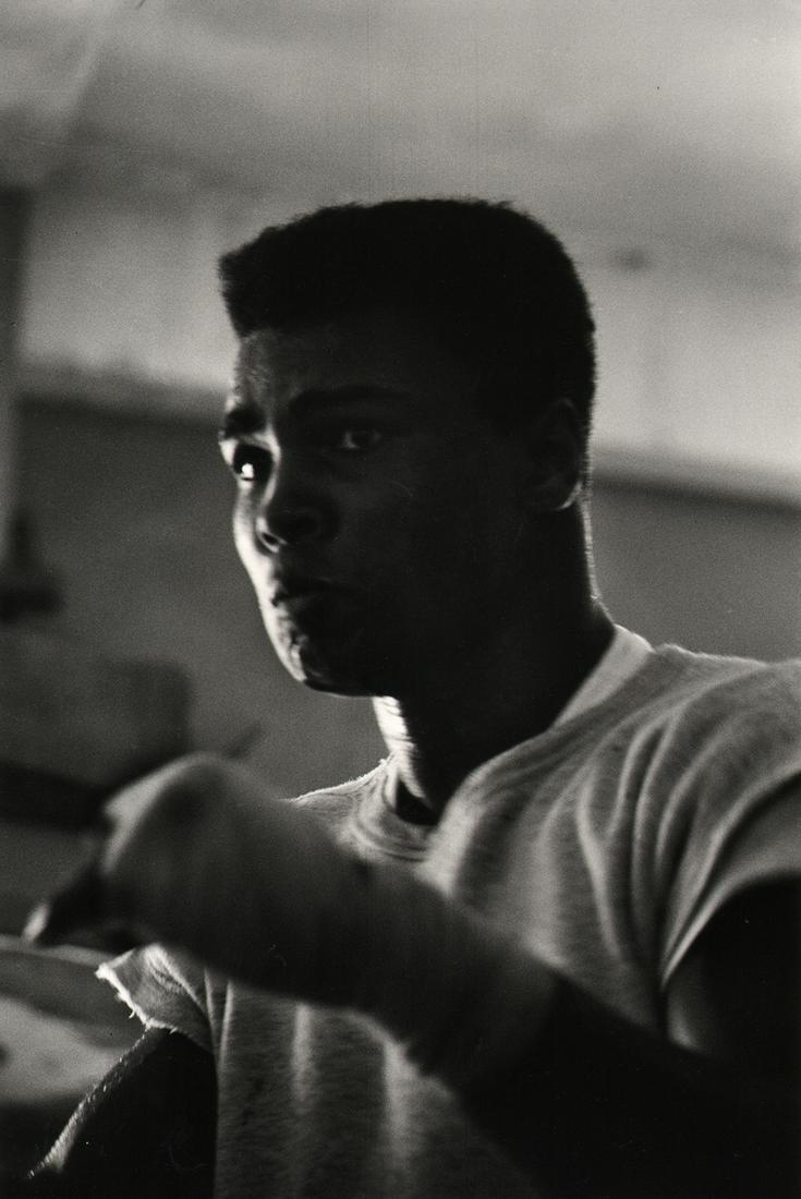 Flip Schulke, Ali at Fifth Street Gym, Miami, c. 1960: Flip Schulke, Muhammad Ali at the Fifth Street Gym, Miami, c. 1960, Gelatin silver print, 14" x 11". Artist's credit affixed to verso. Artist Biography: Flip Schulke, a native of New Ulm, Minnesota an