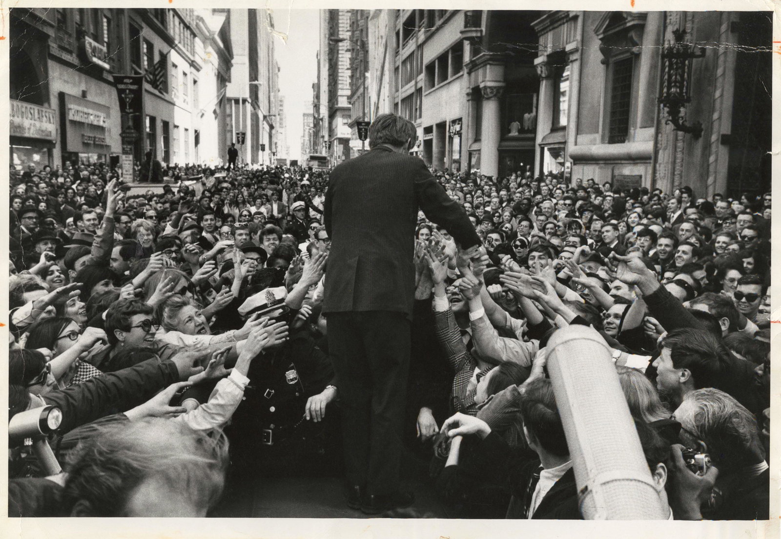 CONSTANTINE (COSTA) MANOS Robert F. Kennedy Campaign: CONSTANTINE (Â“COSTAÂ”) MANOS (1934-), ROBERT F. KENNEDY CAMPAIGN FOR PRESIDENT, NYC, 1968 vintage gelatin silver print; 9 x 13 1/2 (image), 11 x 14 in. (sheet), 16 x 20 in. (matted); Magnum sta