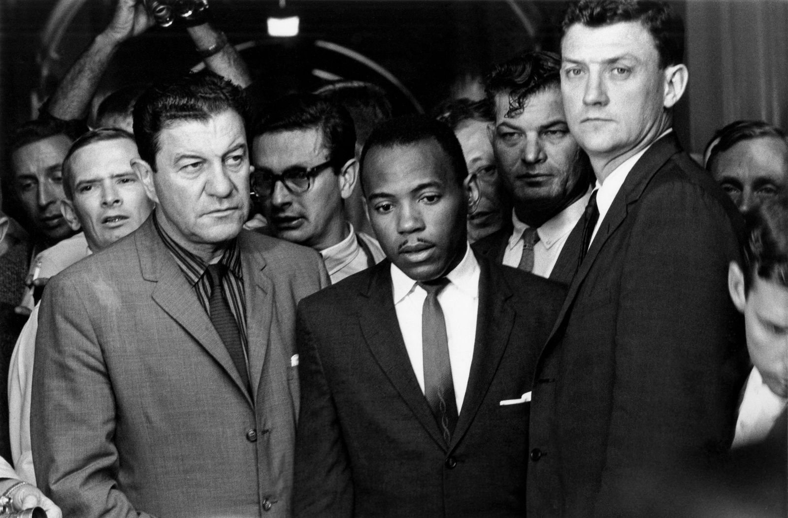 CHARLES MOORE Guarding James Meredith from Harm, 1962: CHARLES MOORE (1931-2010), SEPT 30, 1962 – CHIEF U.S. MARSHALL JAMES MCSHANE AND ASSISTANT ATTORNEY GENERAL FOR CIVIL RIGHTS JOHN DOAR GUARD JAMES MEREDITH FROM HARM, AS FEDERAL MARSHALS UNDER DIREC