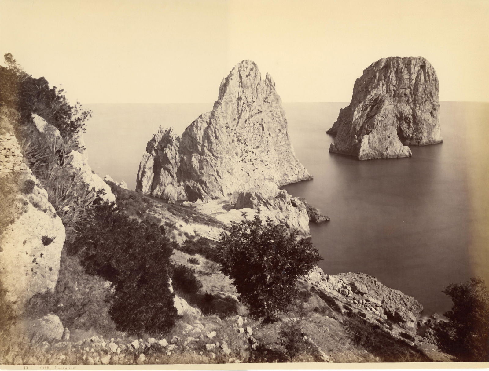 I faraglioni - preso dalla punta Tragara, Capri, c.: GIORGIO SOMMER (1834-1914), I FARAGLIONI - PRESO DALLA PUNTA TRAGARA, c. 1870 vintage albumen print; 11 x 14 in. (sheet); Print No. 4067; Condition: Excellent. GSO-0011. Giorgio Sommer was born in Fra