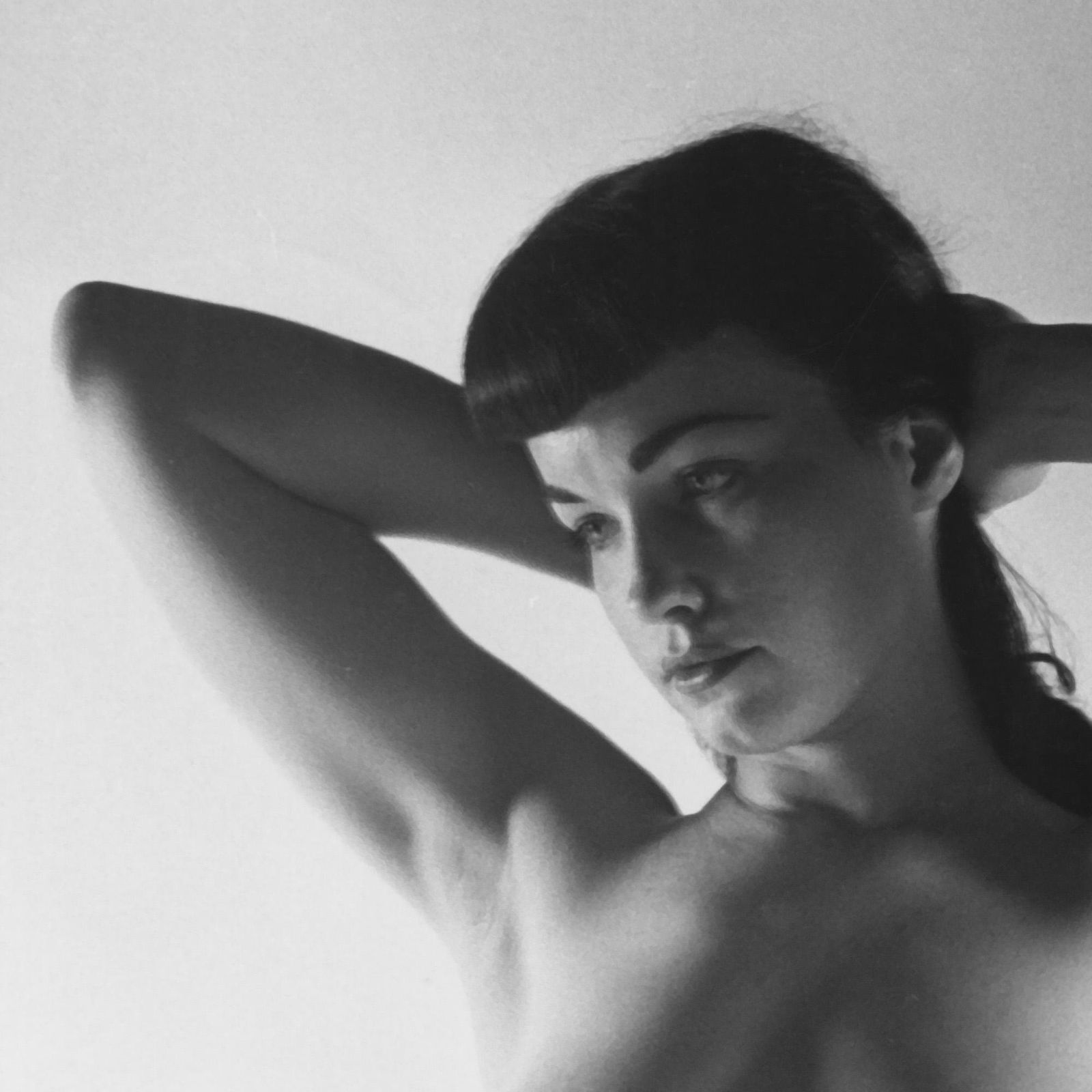 Bettie Page, 1951: Lot 166 PETER BASCH (1921-2004), BETTIE PAGE, 1951 gelatin silver print, printed by Eric Kroll, c. 1989; 14 x 11 in. (sheet); signed; Condition: Excellent. PBA-0261. Peter Basch was born in Berlin, th