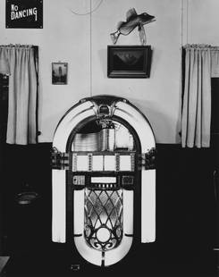 WRIGHT MORRIS, JUKE BOX, SOUTHERN INDIANA, 1950: WRIGHT MORRIS (1910-1998), JUKE BOX, SOUTHERN INDIANA, 1950 gelatin silver print, printed 1980, from the Wright Morris portfolio (1981) ed. 23/50; 9 &frac12; x 7 &frac12; in. (image); signed recto in