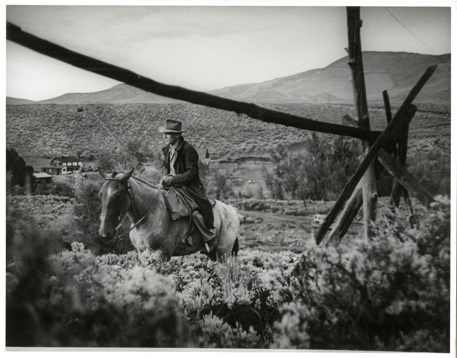 W. EUGENE SMITH, COUNTRY DOCTOR, 1948: W. EUGENE SMITH (1918-1978) COUNTRY DOCTOR, 1948 gelatin silver print, printed later, 10 1/2 x 13 1/2 in. (image), 11 x 14 in. (sheet), signed recto with stylus; Condition: Excellent. Doctor riding a