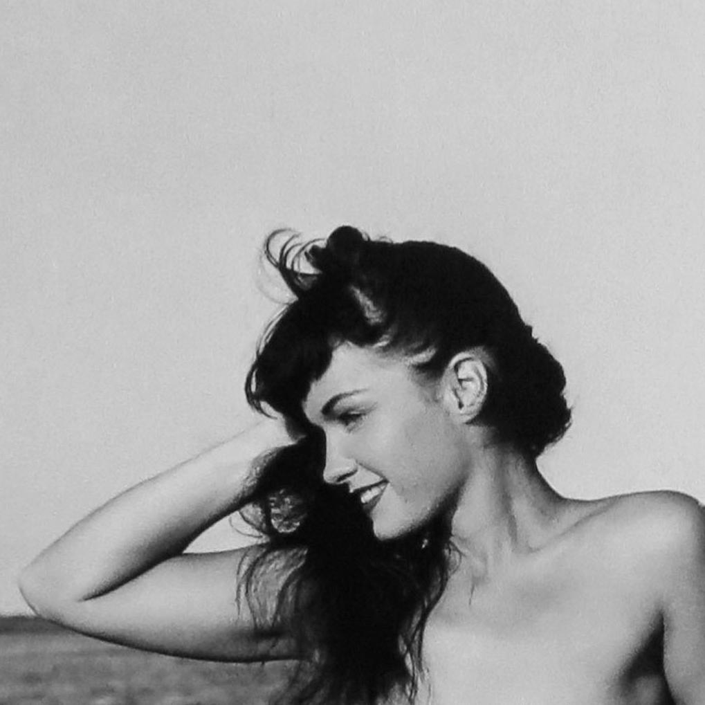 BUNNY YEAGER, BETTIE PAGE (SAIL BOAT), 1954: BUNNY YEAGER, BETTIE PAGE (SAIL BOAT), 1954, gelatin silver print, printed c. 1988-1989 by Eric Kroll; 15 x 14 3/4 in. (image), 20 x 16 in. (sheet), 20 x 24 in. (matted); signed recto in ink; with pri