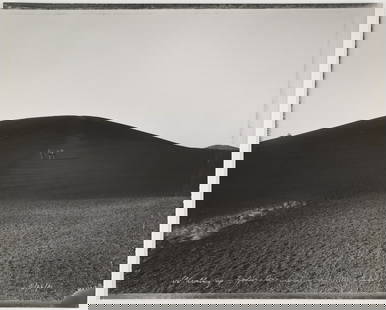 LOT 106, MARK KLETT, WALKING UP INFERNO CONE, CRATERS OF THE MOON, IDAHO, 6/26/81: MARK KLETT (1952-), WALKING UP INFERNO CONE, CRATERS OF THE MOON, IDAHO, 6/26/81 vintage gelatin silver print, 16 x 20 in., titled, dated recto, in silver ink, signed verso. Condition: Excellent. Dome
