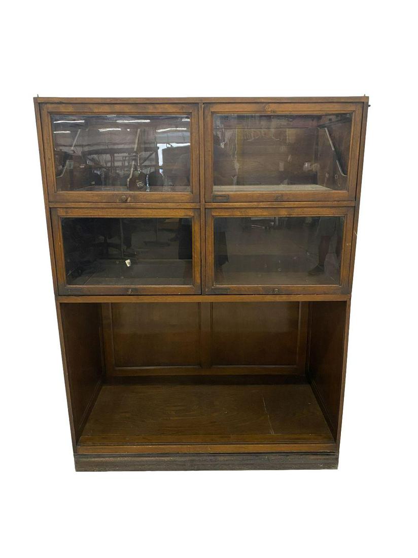 Early 1900s Haberdashery Cabinet: This cabinet has barister style retractable drawers. This cabinet is missing x1 slide out drawer and x1 knob