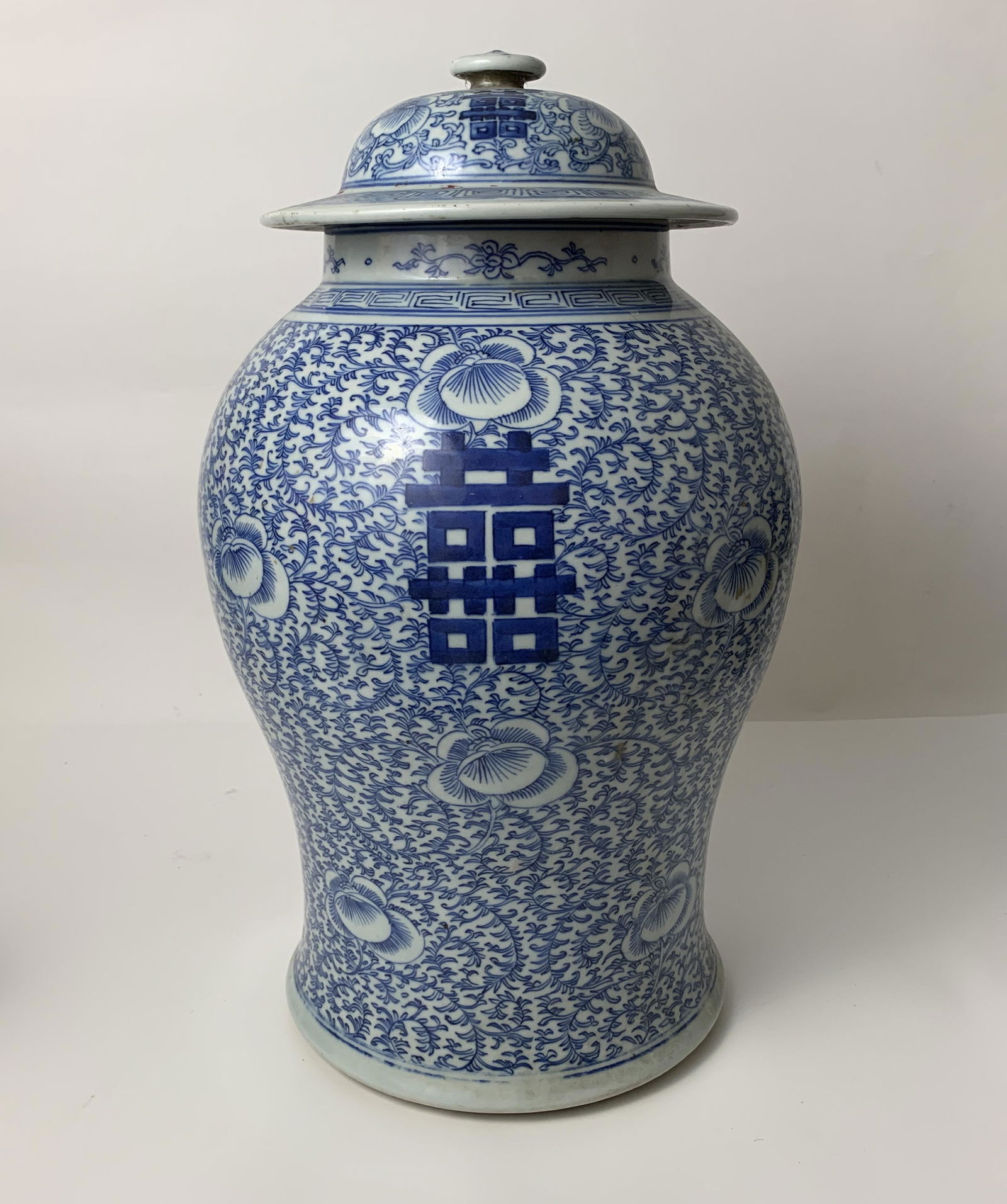 A Chinese Qing Dynasty Large Blue & White Ginger Jar: Dimensions: 17 in (height) x 5.5 in (Lip Diameter) x 7 in (bottom Diameter) x 10.8 lbs in weight