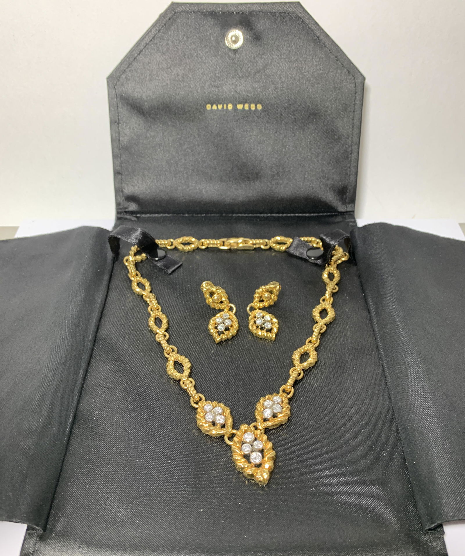 David Webb 18k Gold Diamond Necklace Earrings Set: 18k Yellow Gold, White DIAMONDS: 2.30 Carats , Platinum(Earring Backs) Necklace Dimensions: 40 cm (unclasped length) Pendant Dimensions: 2.6 cm x 1.8 cm Earrings Dimensions: 4.2 x 1.5 cm Total Weight: