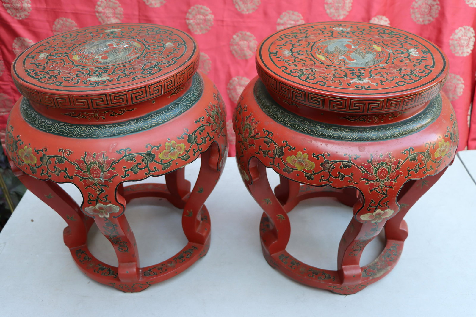 A Pair of Cinnabar Red Lacquer Stool Tables: A Pair of Cinnabar Red Lacquer Stool Tables Provenance: Property of a Gentleman, Life Long Collector of Chinese Works of Art, New York. Approximate Dimensions: 47 cm (Height) x 33 cm (Top Diameter) x 