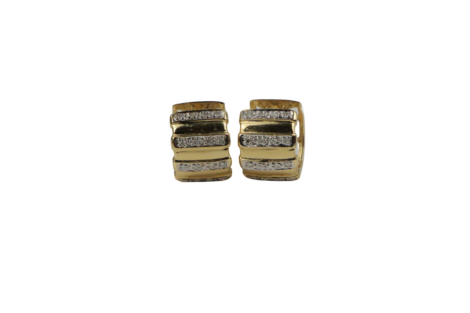 Vintage 14K Gold Diamond Huggie Earrings: Vintage 14K Gold Diamond Huggie Earrings Mounted with approximately 0.3 +/- Carats of near-colorless Diamonds Approximate Dimensions: 1.4 cm (Diameter) x 1 cm (Width) 5.3 grams in weight