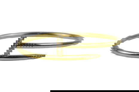 Cartier 18K Gold & Diamond Juste Un Clou Nail Bracelet: Cartier 18K Gold & Diamond Juste Un Clou Nail Bracelet 18K Yellow gold (750/1000), set with (33) brilliant-cut diamonds totaling 0.58 carats. Stamped:Cartier 750 C 17 UW9127 Approximate Dimensions: Si