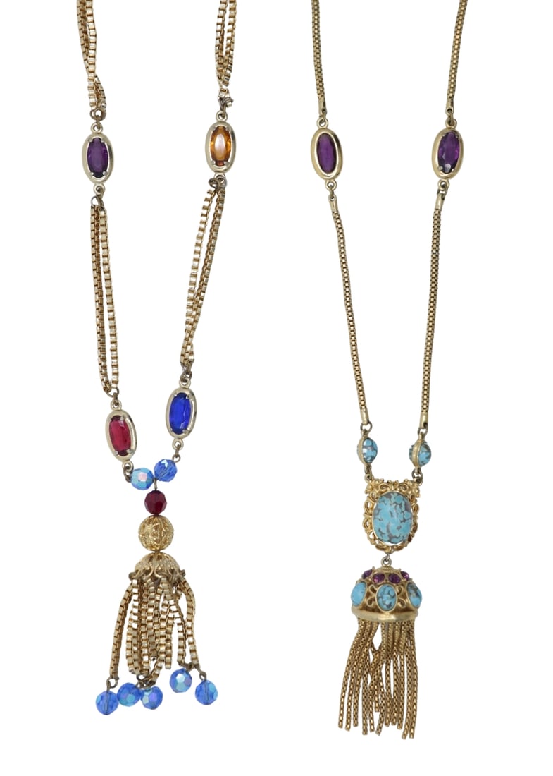 Vintage Pair of Gold Tone & Glass Tassel Necklaces: Vintage Pair of Gold Tone & Glass Tassel Necklaces Approximate Dimensions: 62 cm - 63 cm (Uclasped Length) x 8 cm - 8.5 cm (Pendant Length) 1.2 cm (Width) x1.7 cm - 2.4 cm (Pendant Width) 97.3 grams i