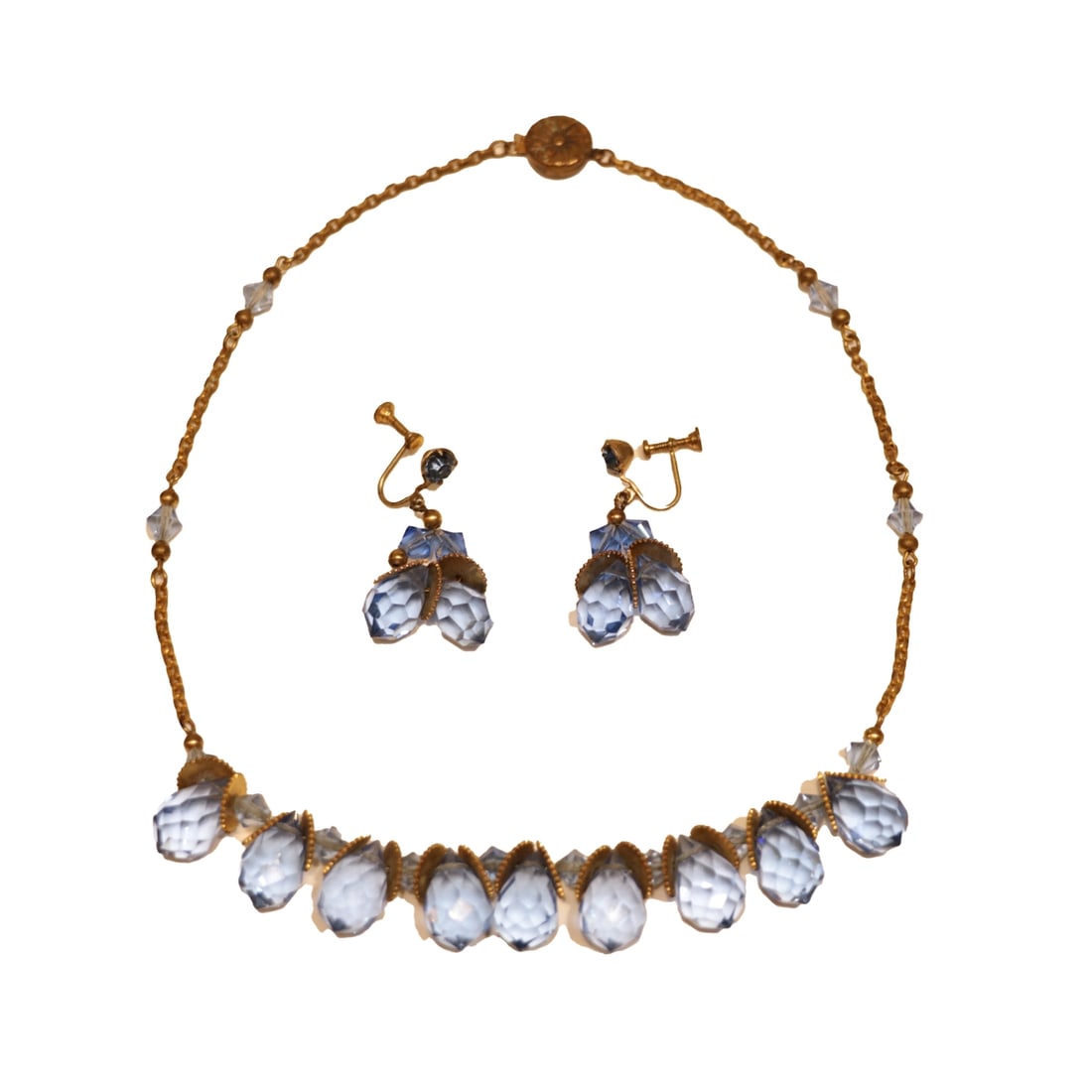 1940's Vintage Gold Tone Blue Crystal Necklace & Earring Set: 1940's Vintage Gold Tone Blue Crystal Necklace & Earring Set Approximate Dimensions: 40.5 cm (Necklace Length) x 3.5 cm (Earring Length) 1.7 cm (Necklace Width) x 2 cm (Earrings Width) 26.8 grams (Nec