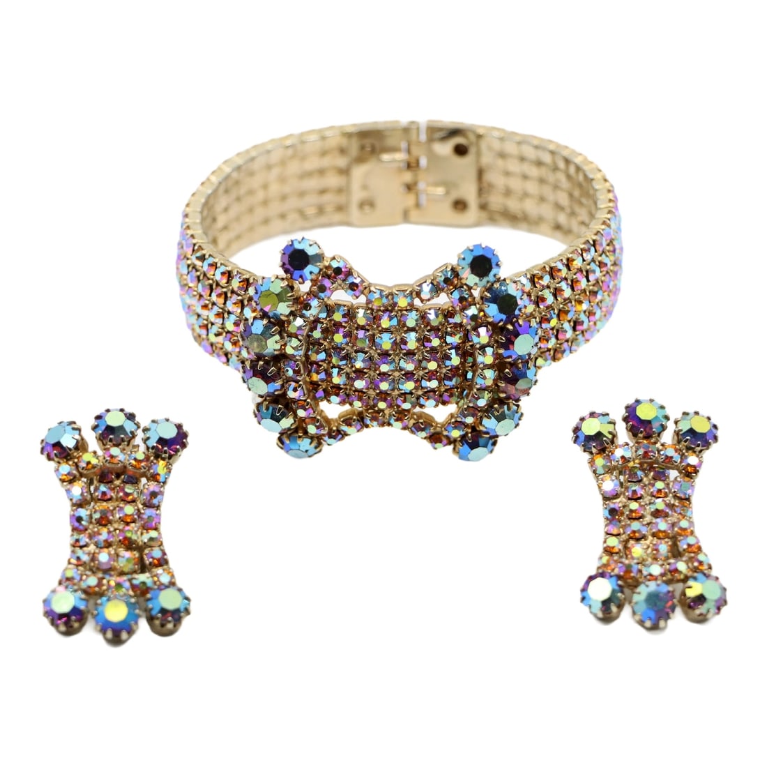 A Set of Vintage Gold Tone Rainbow Rhinestone Bracelet & Earring: A Set of Vintage Gold Tone Rainbow Rhinestone Bracelet & Earring Approximate Dimensions: Bracelet: 18 cm (Circumference) 3.8 cm (Width) 46.7 grams in weight Earrings: 3.5 cm (Length) 2.2 cm (Width) 16