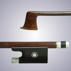 A GERMAN VIOLIN BOW STAMPED E. SARTORY A PARIS