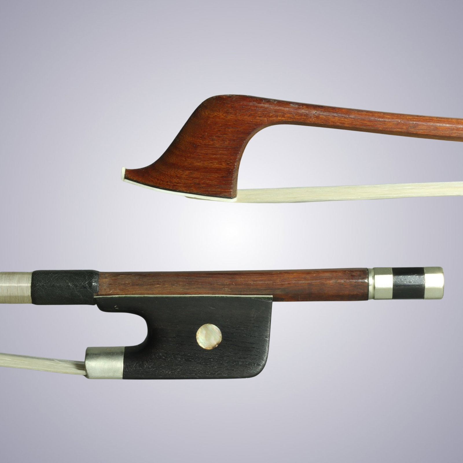 A FRENCH STYLE BASS BOW: A FRENCH STYLE BASS BOW Of Octagonal Pernambuco Stick, Ebony & Nickel mounted. Silver Winding Unstamped Approximate Dimensions: 69.7 cm (Total Length - Head to Adjustor) 117.6 Grams in weight Discount