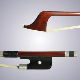 A SILVER BASS BOW