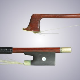 A VIOLIN BOW STAMPED REICHEL