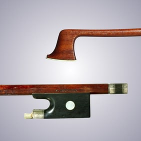 A VIOLIN BOW STAMPED K. MULLER