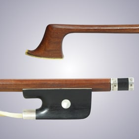 A VERY STRONG SILVER CELLO BOW STAMPED TOURTE