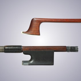 A VIOLIN BOW STAMPED G.A. PFRETZSCHNER ***