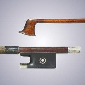 A VIOLIN BOW STAMPED LYON & HEALY CHICAGO