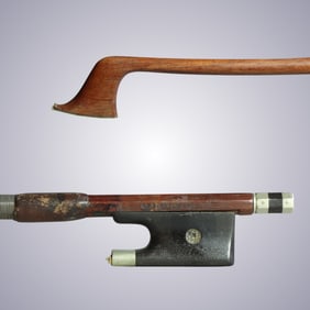 A VERY STRONG CELLO BOW STAMPED H.R. PFRETZSCHNER