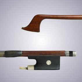 A STRONG SILVER VIOLIN BOW STAMPED CARL FISCHER NEW YORK