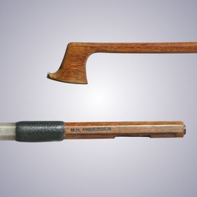 A STRONG VIOLA BOW STICK STAMPED M.H. ANDERSON
