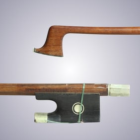 A VIOLIN BOW STAMPED N. LEMAIRE A PARIS MADE BY MORIZOT FRERES