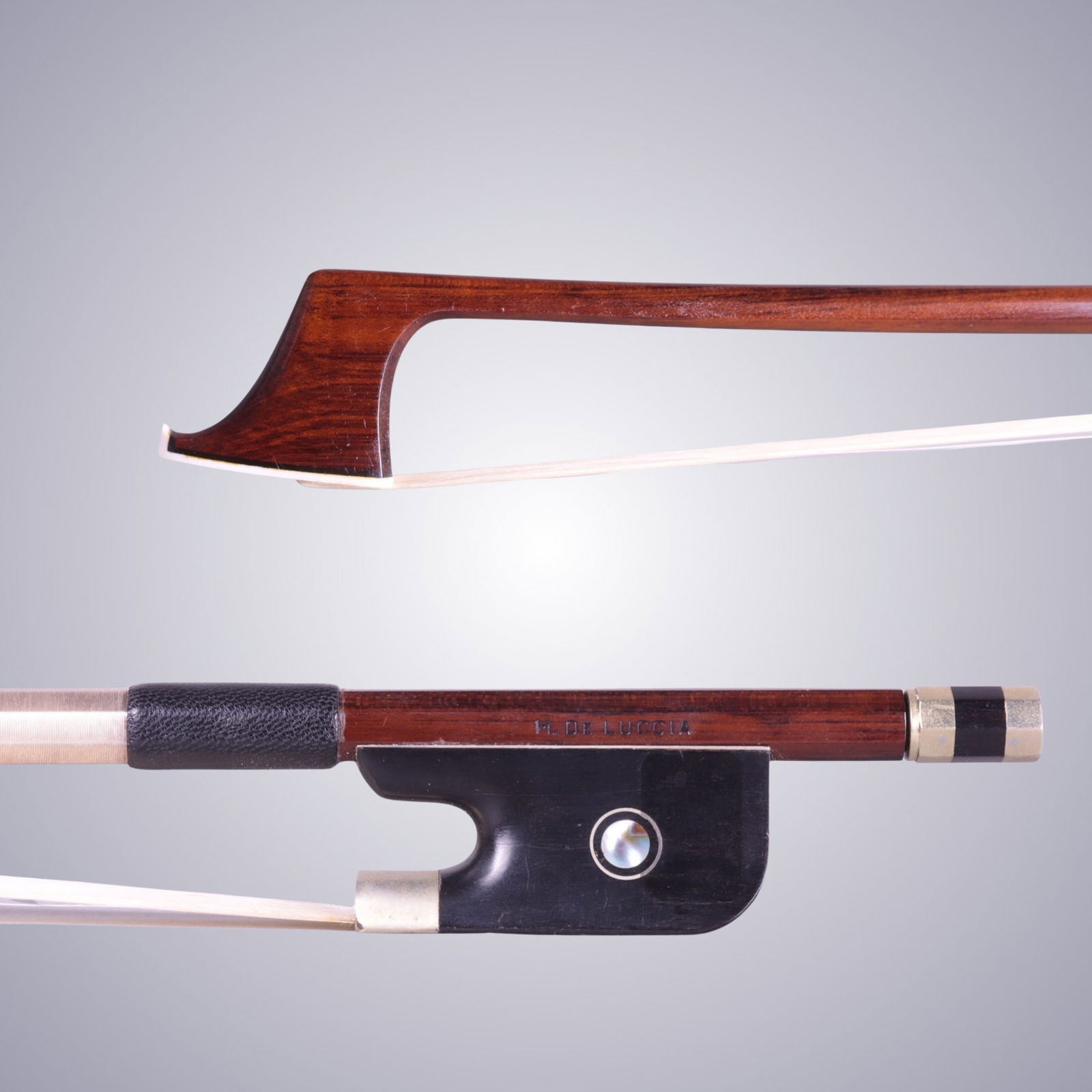 A CELLO BOW STAMPED M. DELUCCIA (1 of 13)