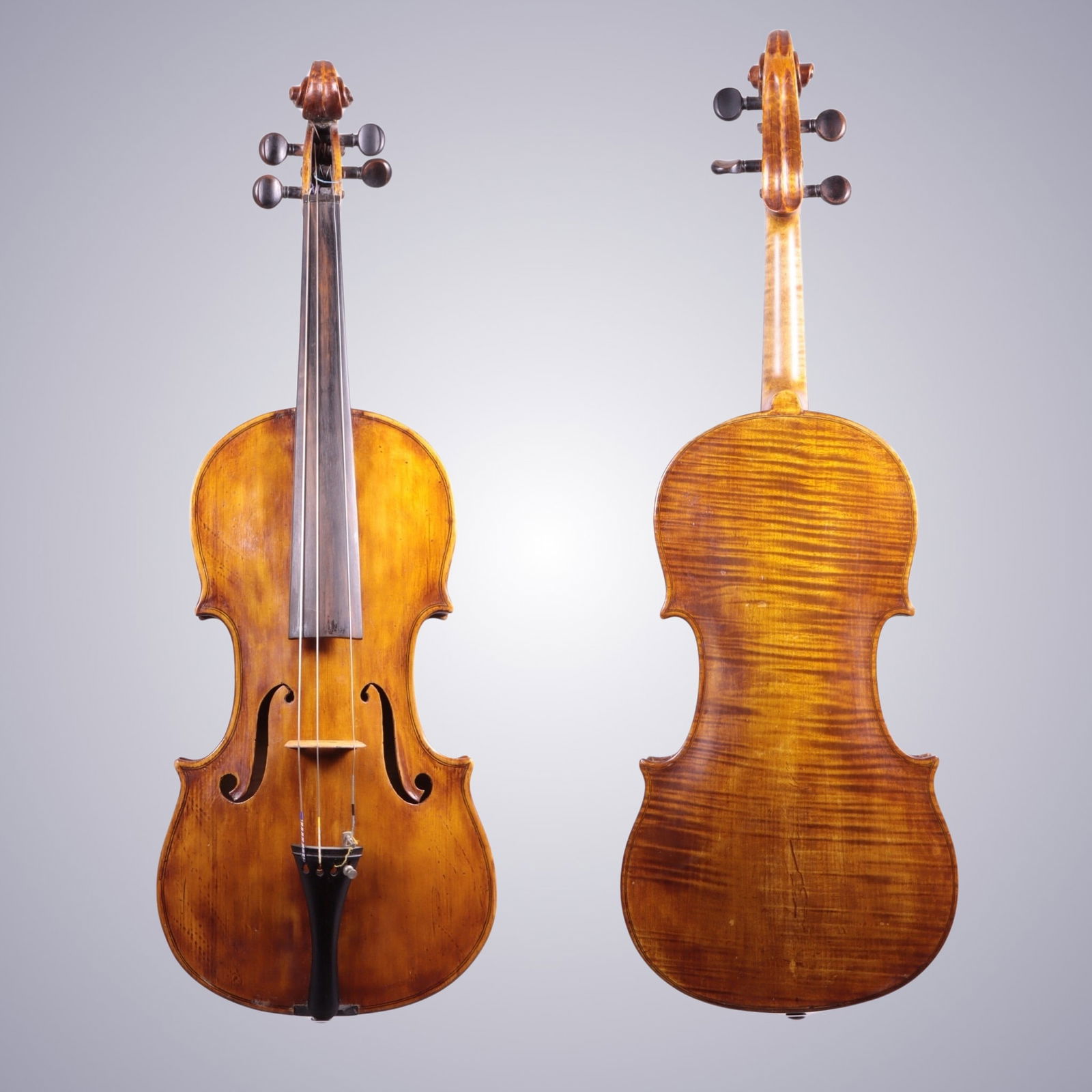 A VIOLA LABELED MARNITZ FRIGYES: A VIOLA LABELED MARNITZ FRIGYES Labeled on Interior: Marnitz Frigyes mester Budapest Approximate Dimensions: 63 cm (Total Length) 38 cm (Length of Back) 17.1 cm (Upper Bout Width) 11.8 cm
