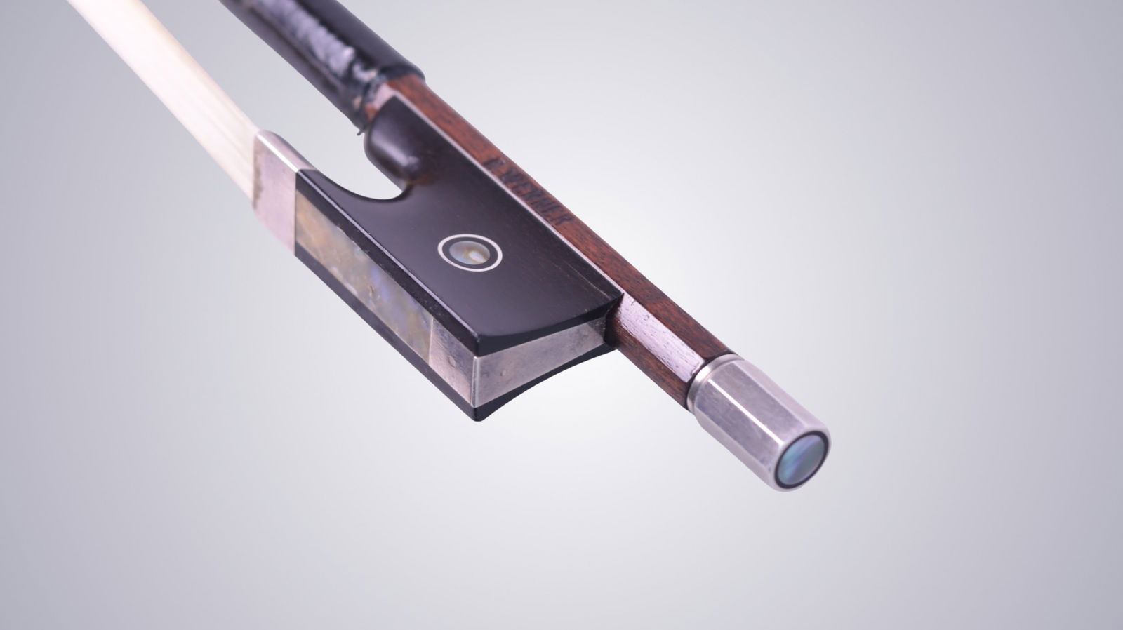 A VIOLIN BOW STAMPED E. WERNER - 10