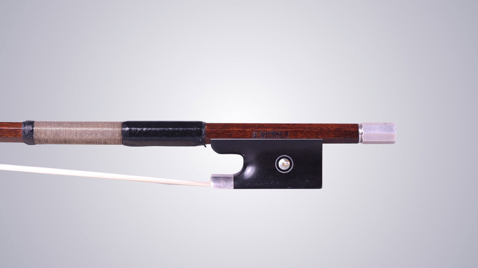 A VIOLIN BOW STAMPED E. WERNER - 11