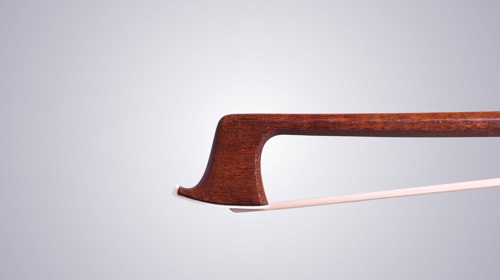 A VIOLIN BOW STAMPED E. WERNER - 3